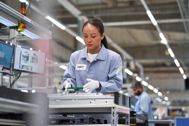 Technician assembling server hardware at HPE
